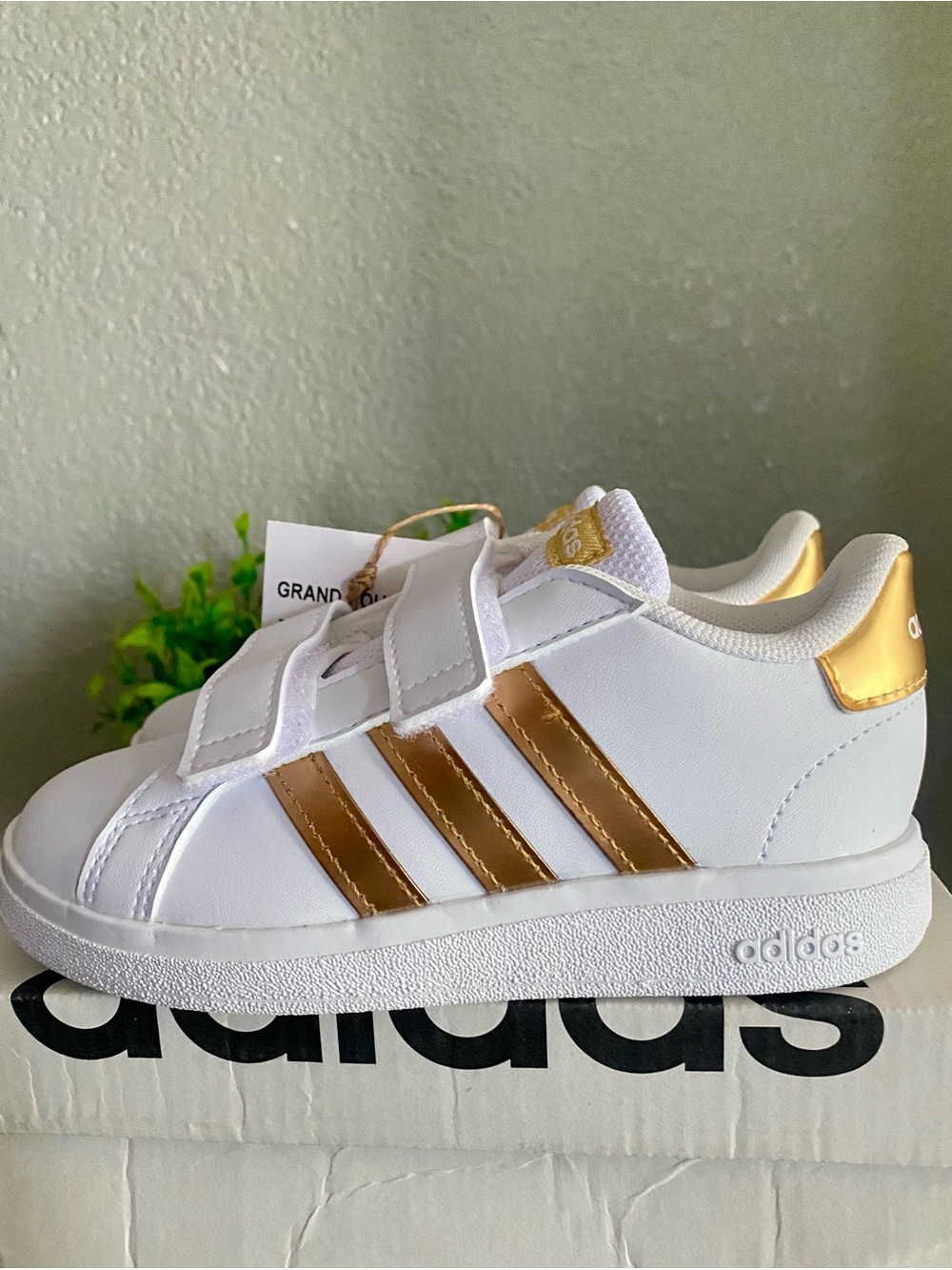adidas Kids White Sneakers with Gold Stripes